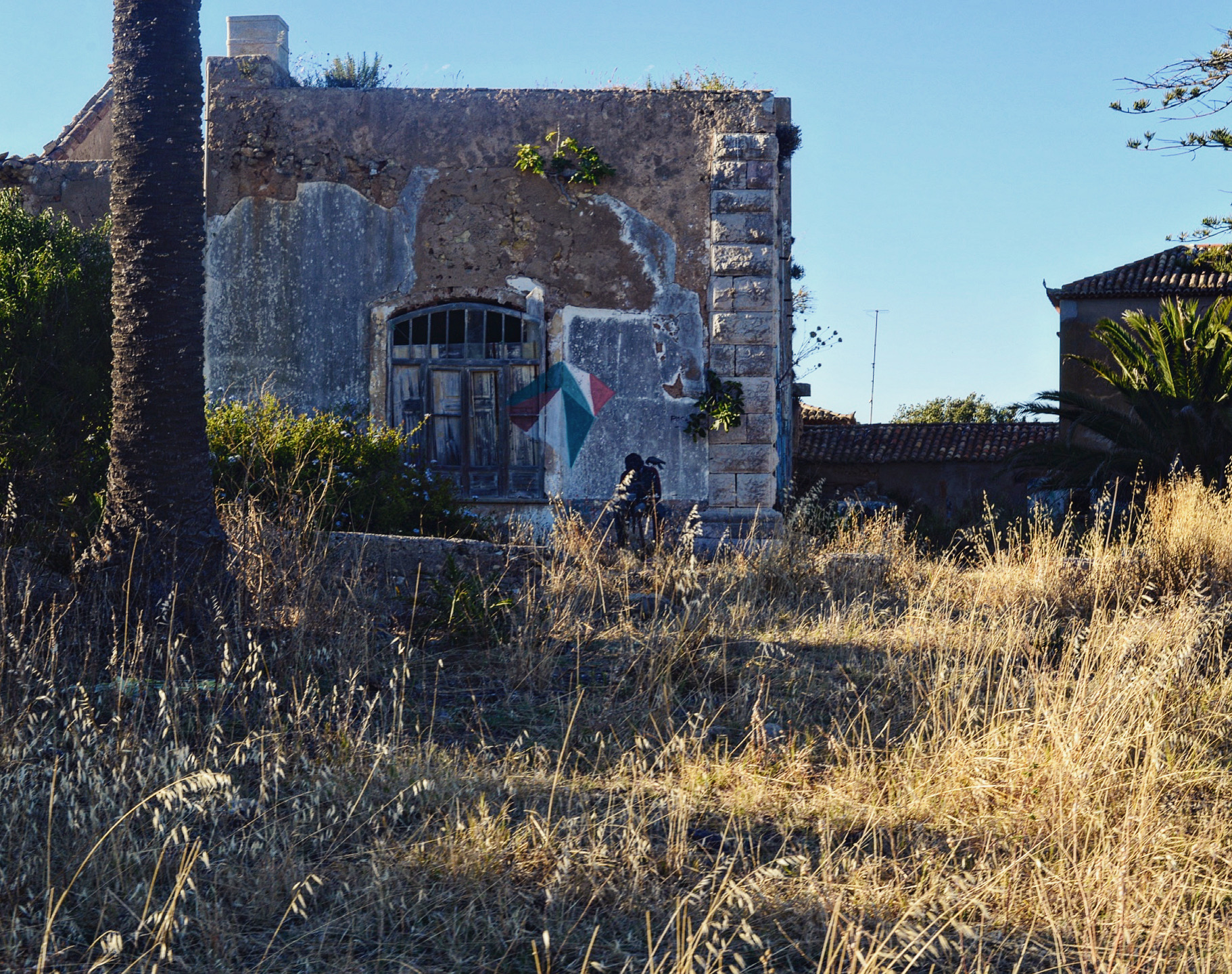 A mural on an old stone ruin, Sicily, Italy