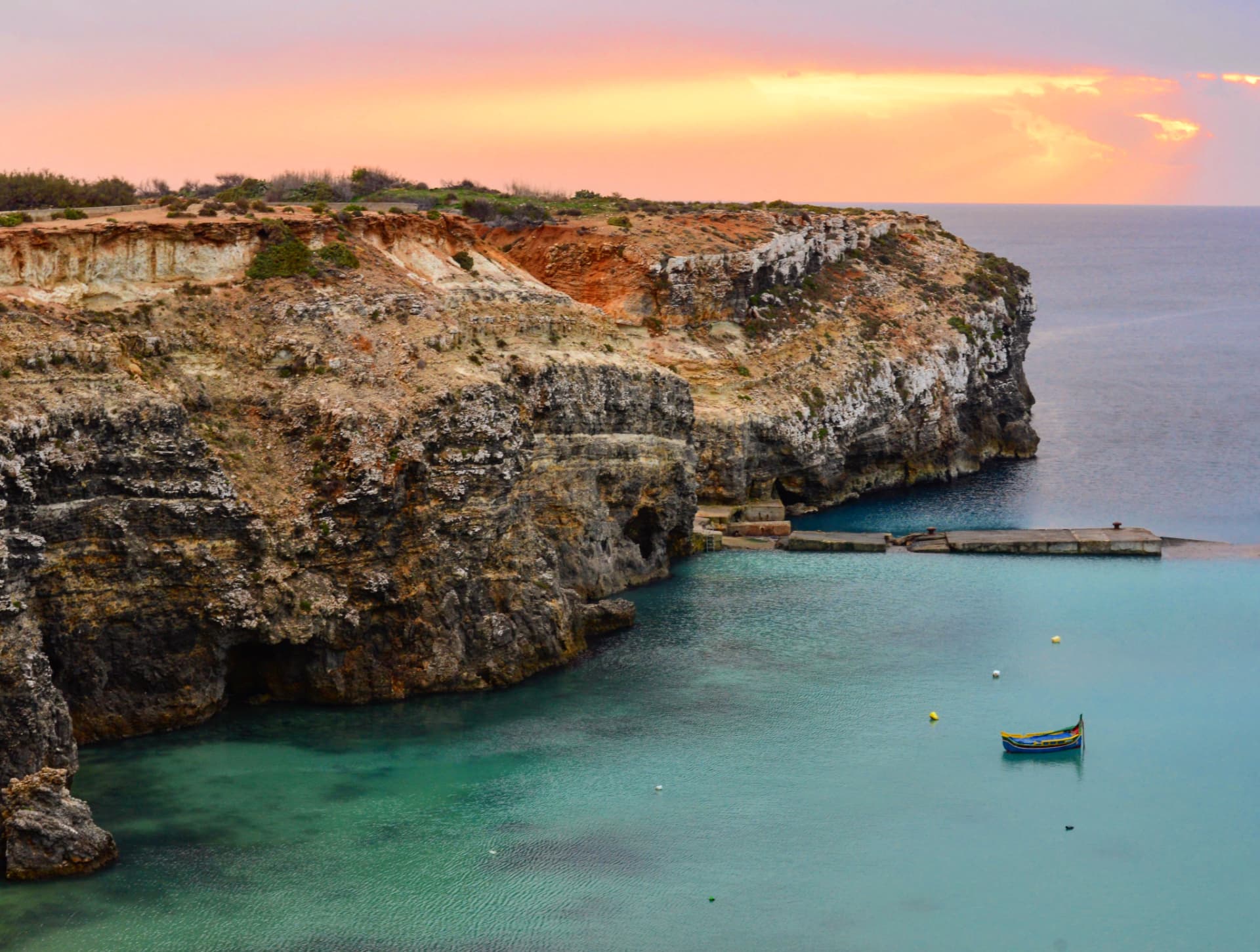 Turquoise water below the cliffs, Malta